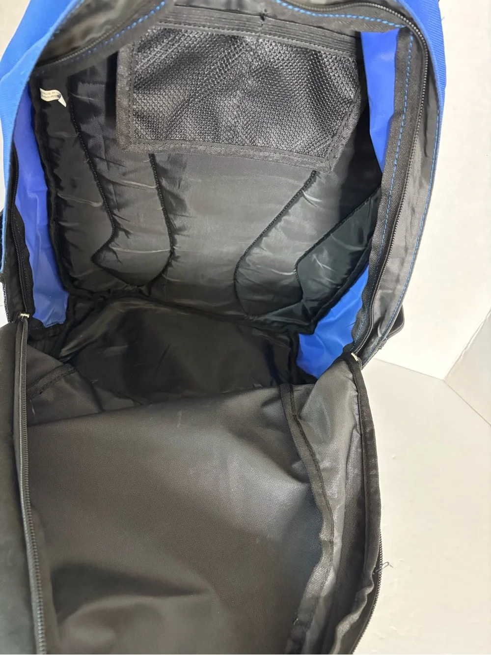 The Umbro soccer backpack features a distinctive blue diamond pattern